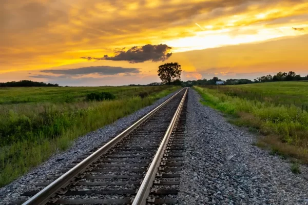 railroad tracks sunset